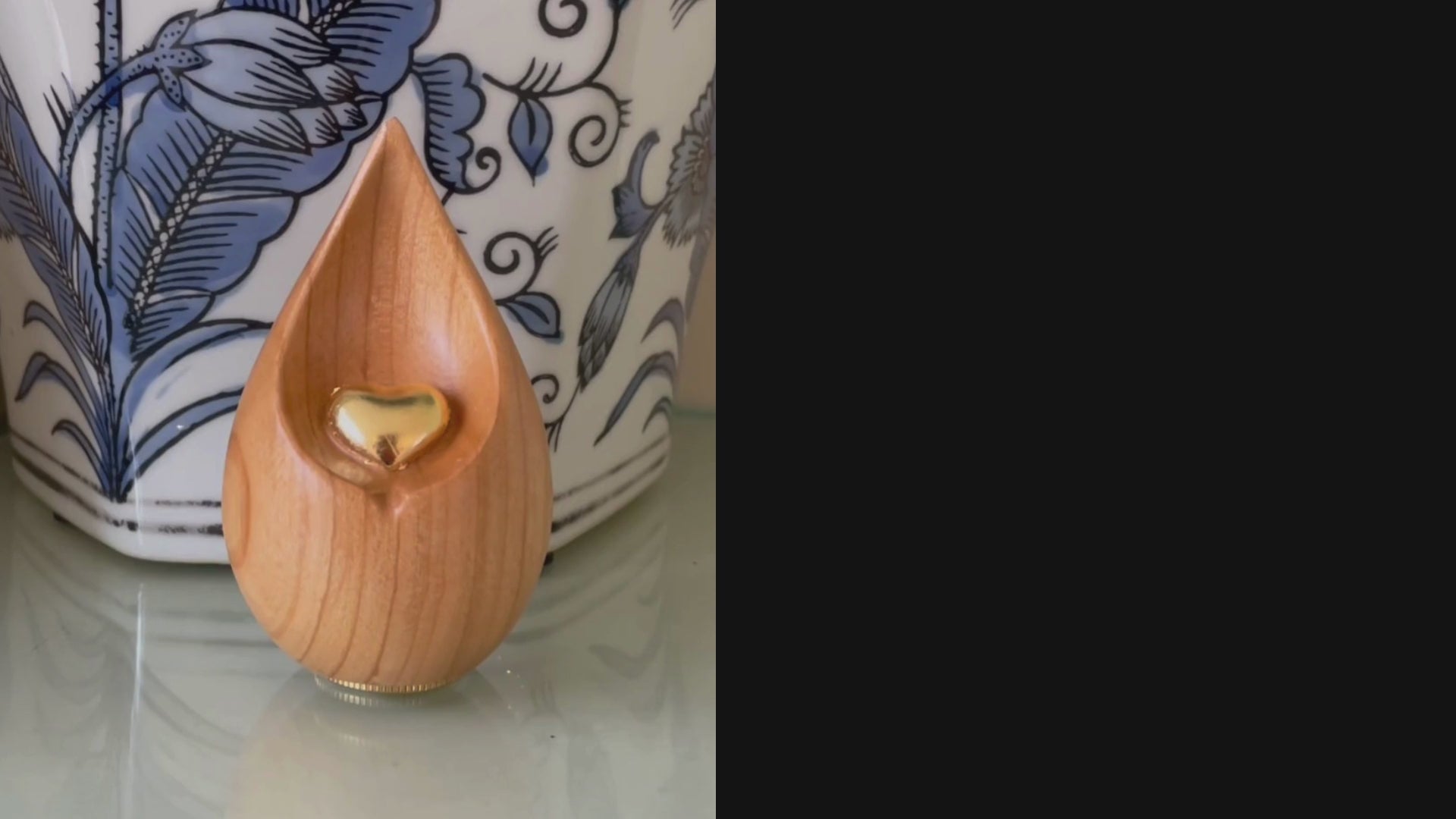 Load video: &quot;Handcrafted wood teardrop keepsake urn for ashes, showcasing its elegant design and high-quality craftsmanship.&quot;